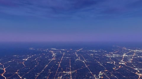 Twilight city lights under purple sky — Stillmotion