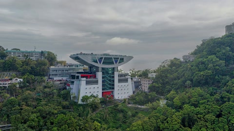 City skyline beside green hills — Stillmotion