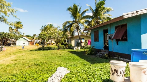 Village homes with clothes drying outside — Stillmotion
