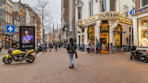 Brick-paved city street with shops — Stillmotion