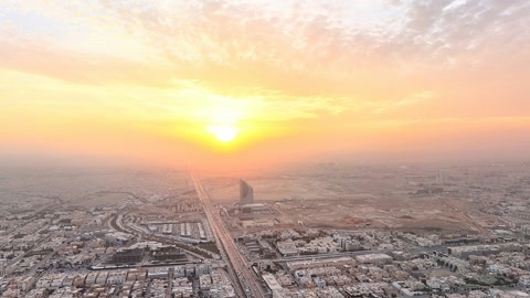 Aerial cityscape at sunrise — Stillmotion