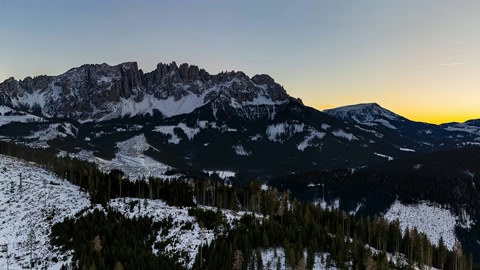 Snowy mountain ridges at sunset — Stillmotion