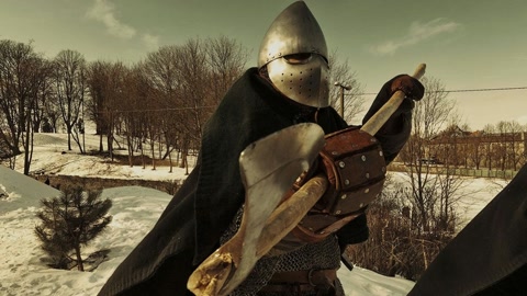 Armored medieval warriors in snowy courtyard — Stillmotion