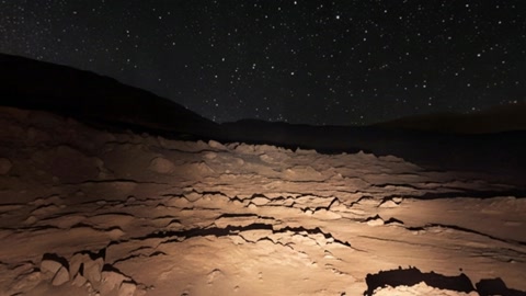 Starry desert terrain at night — Stillmotion