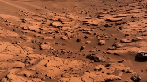 Mars rover exploring rocky desert terrain — Stillmotion