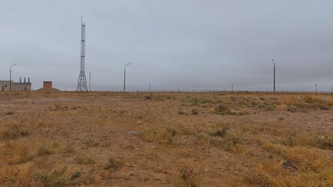 Rocket launch over desert terrain — Stillmotion
