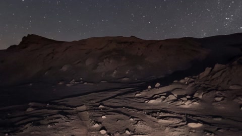 Night volcanic terrain with rover equipment — Stillmotion
