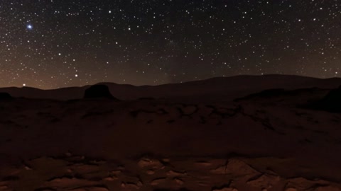 Night volcanic desert under stars — Stillmotion