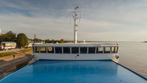 Riverfront city and ferry dock — Stillmotion