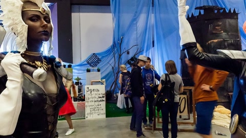 Costumed performers at convention hall — Stillmotion