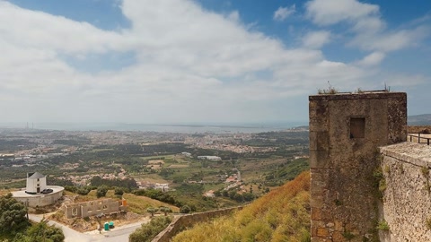 Hilltop fortress with surrounding town views — Stillmotion