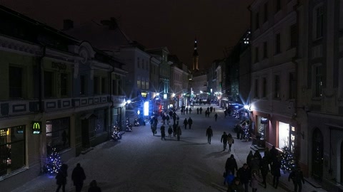 Snowy city street at night — Stillmotion