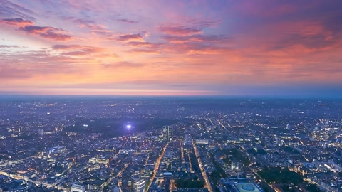 Aerial cityscape at dusk — Stillmotion