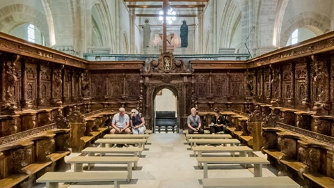 Church interior with ornate wooden choir stalls — Stillmotion