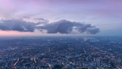 Aerial cityscape with river at dusk — Stillmotion