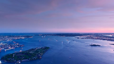 Aerial city and harbor at sunset — Stillmotion