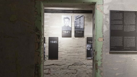 Dim prison cell with barred window — Stillmotion
