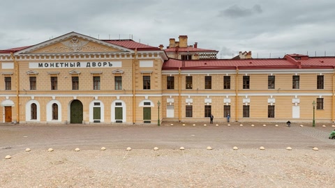 Historic courtyard with yellow church — Stillmotion