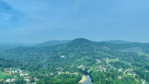 Village in green mountain valley — Stillmotion