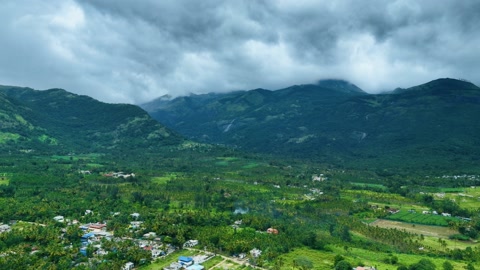 Village in green mountain valley — Stillmotion