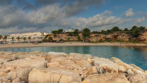Rocky lagoon under cloudy skies — Stillmotion