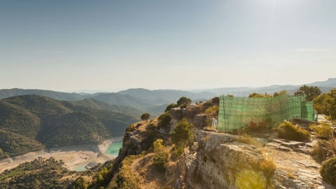 Rocky hillside road and village — Stillmotion