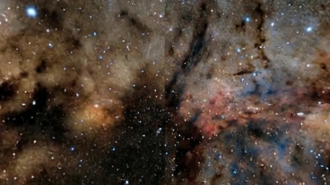 Dense star field with glowing nebula bands — Stillmotion