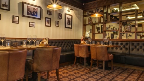 Upscale restaurant interior with dining tables — Stillmotion