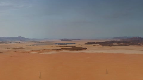 Desert sand dunes and rocky ridges — Stillmotion