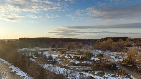 Snowy marsh with frozen river — Stillmotion