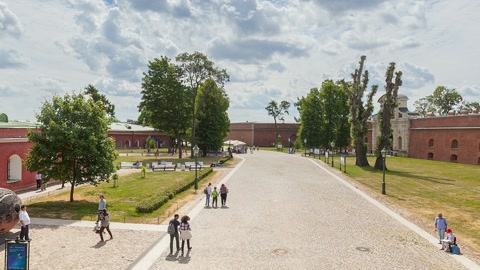Campus courtyard with red brick buildings — Stillmotion