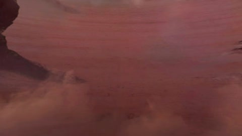 Rock arch in rocky desert terrain — Stillmotion