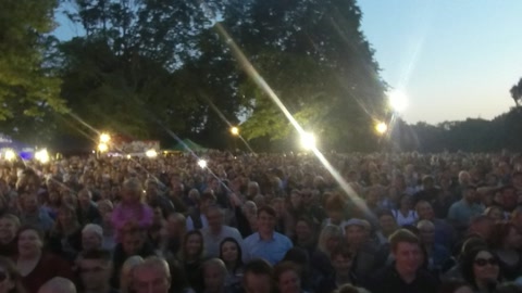 Outdoor concert stage with crowd — Stillmotion