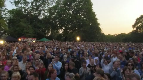 Outdoor concert stage with large crowd — Stillmotion
