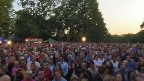 Outdoor concert stage crowd — Stillmotion