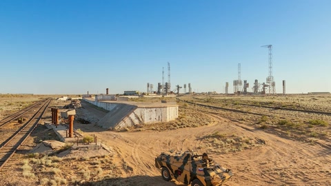 Sandy desert rail yard — Stillmotion