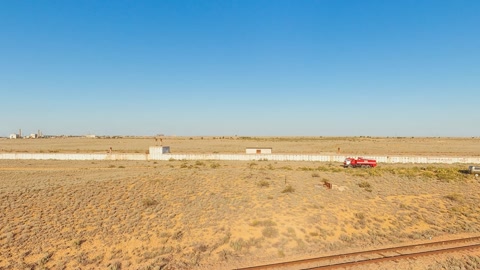 Desert rail yard with rocket sections — Stillmotion