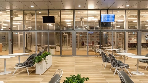 Modern airport lounge interior at night — Stillmotion