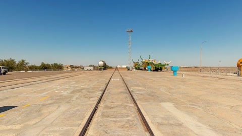 Industrial drilling site with flags and towers — Stillmotion