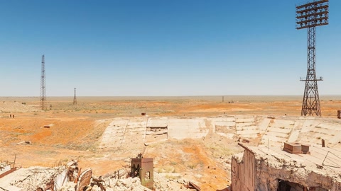 Abandoned industrial site with towers — Stillmotion