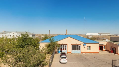 Sandy roadside with sparse buildings — Stillmotion