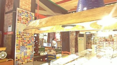 Bakery interior with staff and display cases — Stillmotion