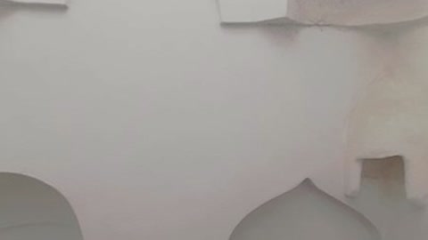 White carved alcoves in fog — Stillmotion