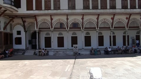 Historic courtyard with stone buildings — Stillmotion