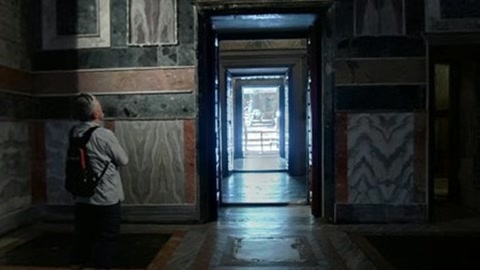 Dim burial chamber interior — Stillmotion