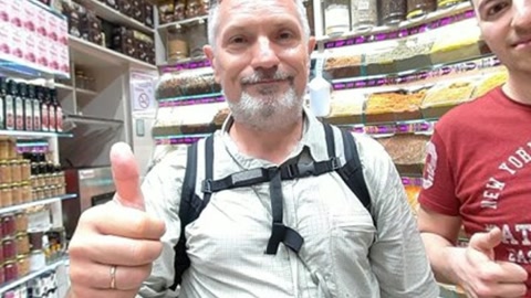 Candy store aisle with shoppers — Stillmotion