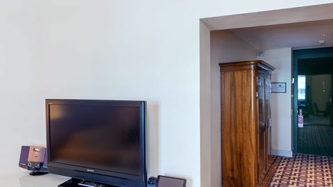 Television room with sofa and desk — Stillmotion