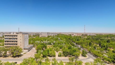 Residential district with green roads and towers — Stillmotion