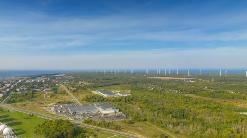 Aerial view of industrial port and shoreline — Stillmotion