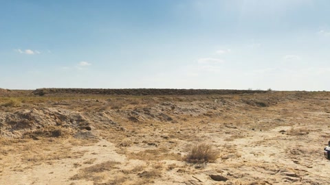 Rocket launch over desert terrain — Stillmotion